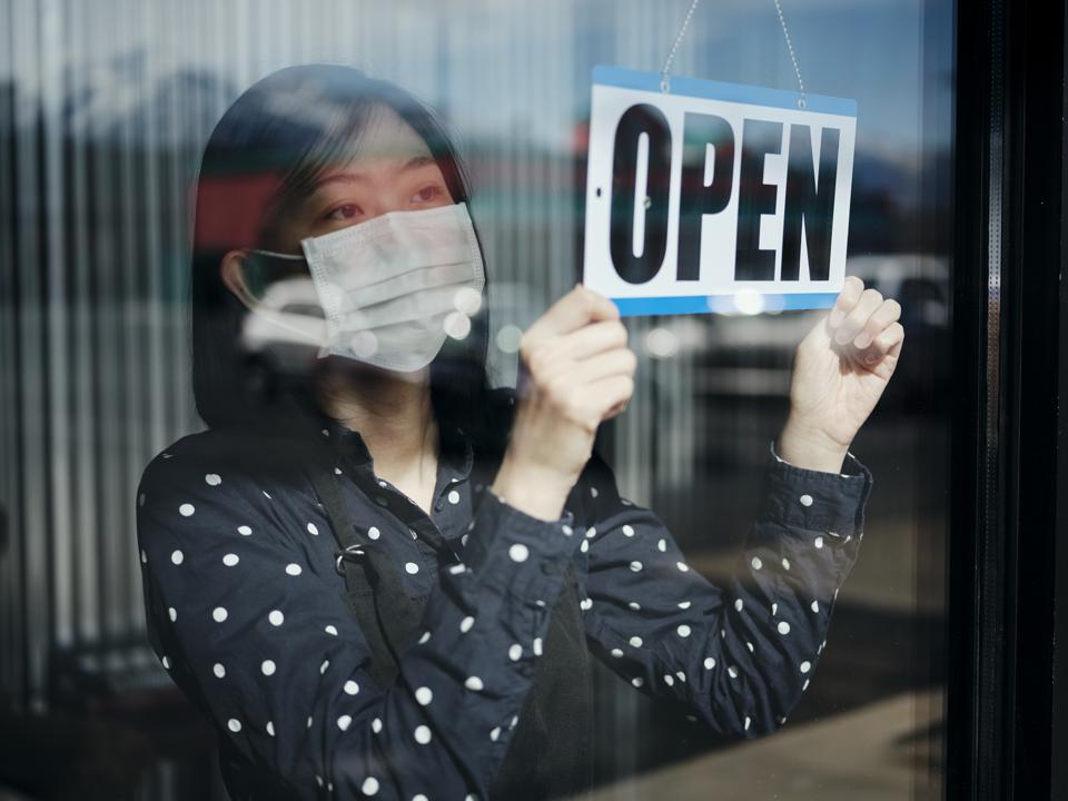 Business owner open sign