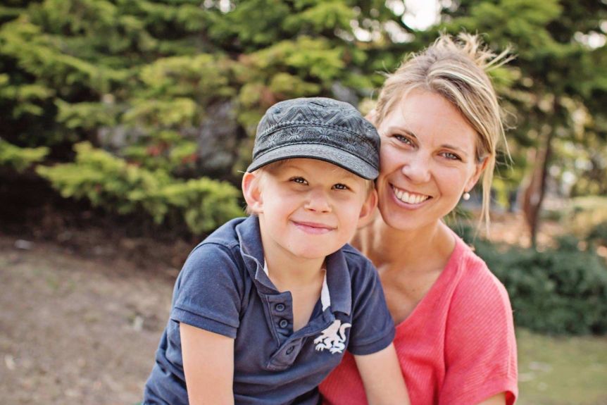 Portrait of demographer Lisa Denny with her son Rory, who is disabled
