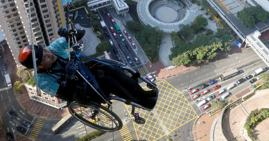Effort to Climb Skyscraper in Wheelchair Captivates Hong Kong