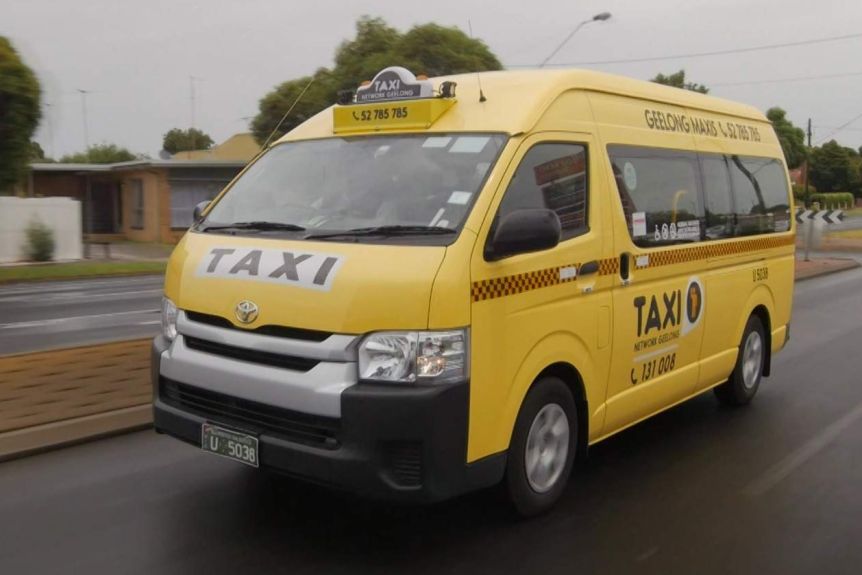 A wheelchair taxi drives down a street in Geelong.