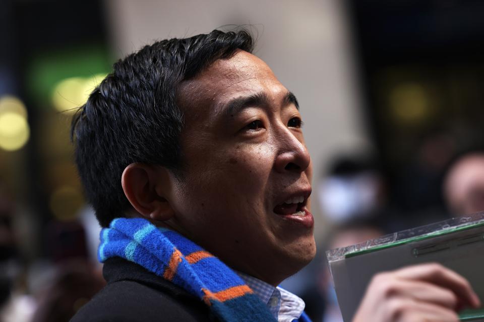 New York City mayoral candidate Andrew Yang provides signatures to officially add a name to the ballot