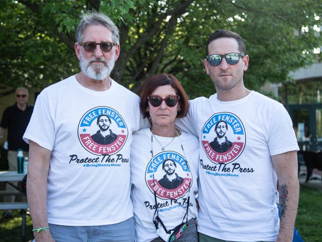 From left, Danny Fenster's father Buddy Fenster, Mother Rose Fenster and brother Bryan Fenster in a pop-up shop to raise awareness of released journalist Danny Fenster outside Gillham Recreation Center in Huntington Woods on Friday, June 4, 2021 .