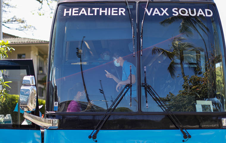 JAMM AQUINO / MAY 22 Students, faculty and their families will be escorted to the Punahou School in Makiki aboard the Hawaii Pacific Health vaccination bus for COVID-19 vaccination on May 22nd.