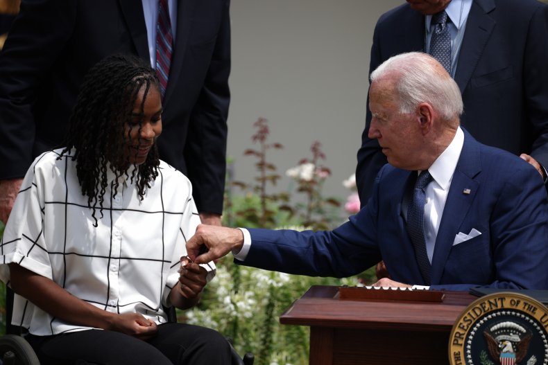 Biden hands Tyree Brown a pen