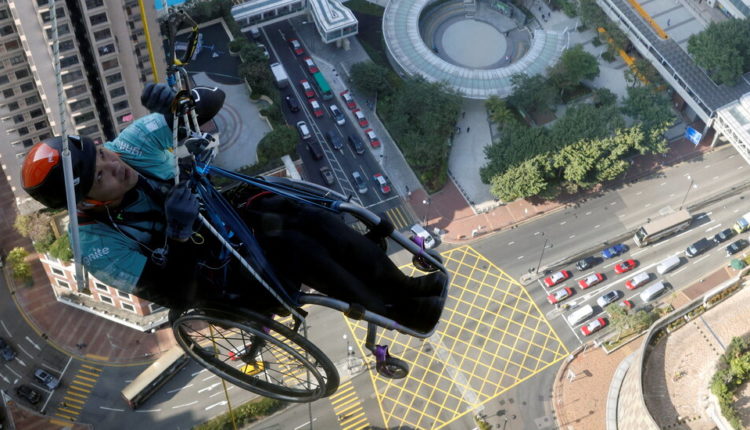 Effort to Climb Skyscraper in Wheelchair Captivates Hong Kong