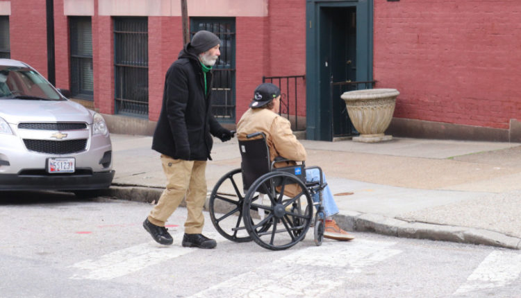 In Baltimore, disability advocates are suing over sidewalk conditions –